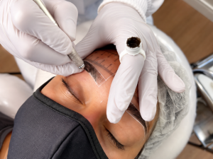 Microblading eyebrow treatment at London Body Clinic creating natural-looking hair strokes for fuller and more defined brows